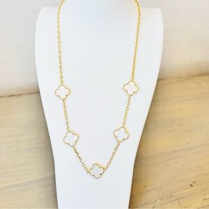 Delicate Gold Necklace with White Clover Motifs
